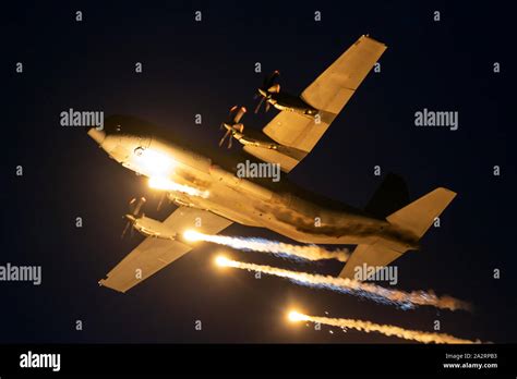 C130 firing flares hi-res stock photography and images - Alamy