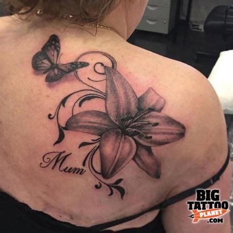 Nicola B - Black and Grey Tattoo | Butterfly tattoo on shoulder, Lily flower tattoos, Tiger lily ...