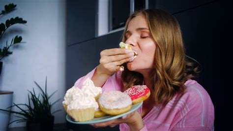 Enjoying Cupcake: Food Calories & Appetite Stock Footage SBV-326289937 ...