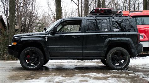 Lifted Jeep Patriot. 235/65r17 Cooper Discoverer AT3 tires, 2.125in RRO ...