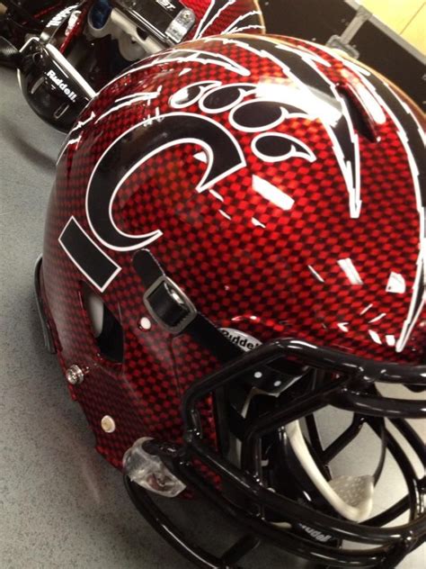 Cincinnati Bearcats pull off the red helmets beautifully. One of the best helmets I've seen. I ...