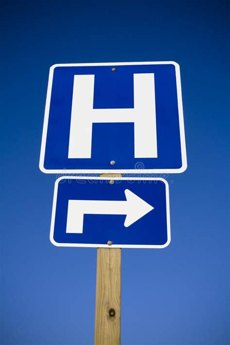 Hospital sign. With arrow and deep blue sky , #Aff, #arrow, #sign, #Hospital, #sky, #blue #ad