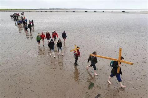 Pilgrims walk more than 100 miles for annual Easter journey to Holy Island - Chronicle Live