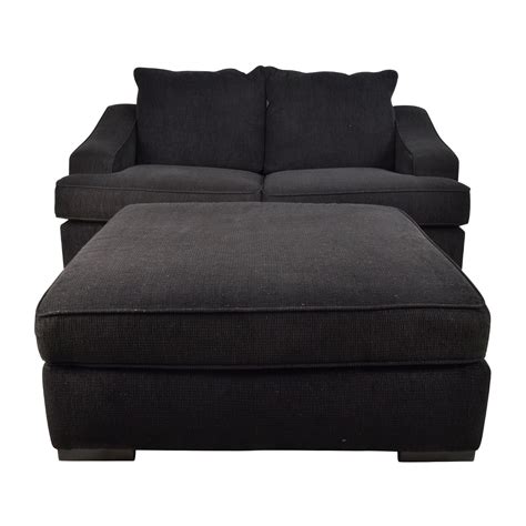 67% OFF - Black Cloth Loveseat and Matching Oversized Ottoman / Sofas