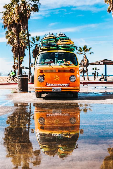 Orange van with surfboard on top Cars | Surfing, Aesthetic pictures, Aesthetic wallpapers