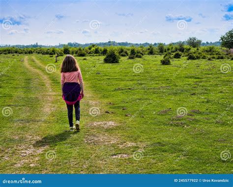 Girl walking in nature stock photo. Image of active - 245577922