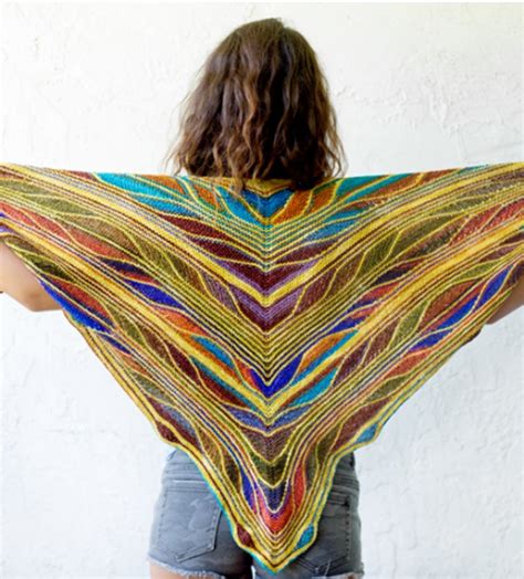 A stunning short row shawl that looks like the wings of a butterfly! Designed by MarinJa Knits ...