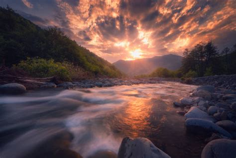 fast mountain river flowing In beautiful sunset time | Beautiful sunset ...