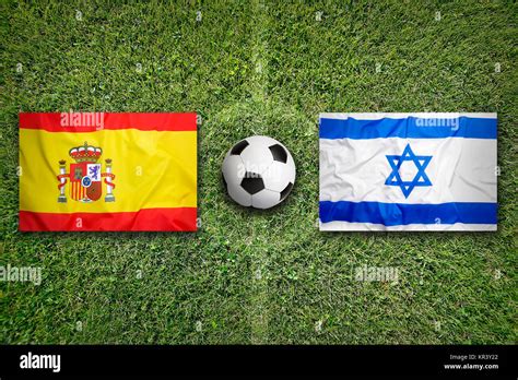 Spain vs. Israel flags on soccer field Stock Photo - Alamy