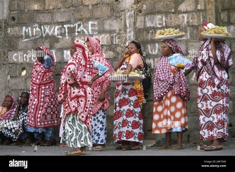 The Comoro Archipelago, island Anjouan, Mutsamudu, wedding ceremony, women, tablet, flower ...