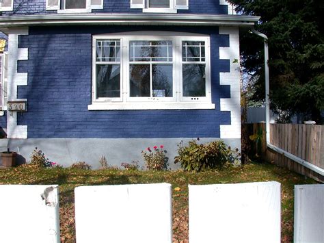 Blue and white brick house | corner of 27th St. and Avenue D… | Flickr