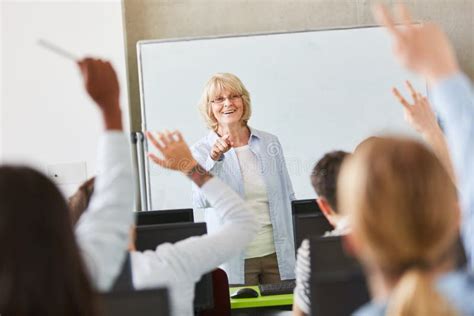 Raised Hands in School Lessons Stock Photo - Image of applied ...