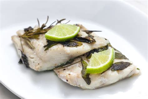 White Fish Fillet Baked with Herbs Stock Photo - Image of white, appetizer: 266499100