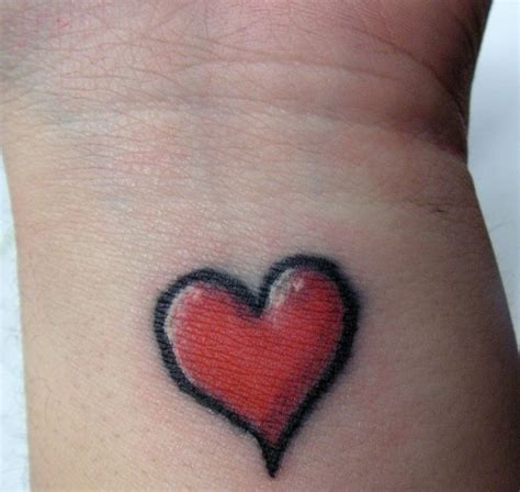 Pin by Emma Potter on tatties | Heart tattoo designs, Simple heart tattoos, Red heart tattoos