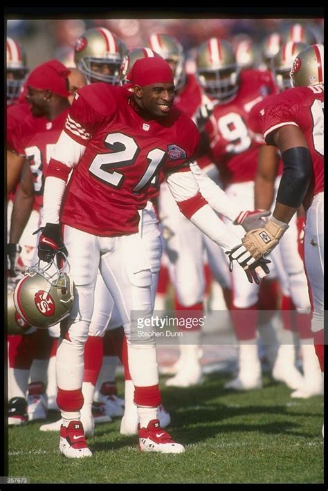 Defensive back Deion Sanders of the San Francisco 49ers celebrates ...