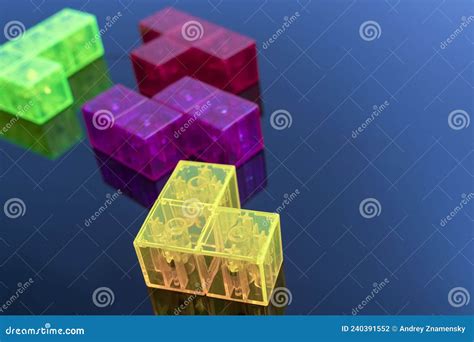 Three-dimensional Colored Tetris Figures on Glossy Black Glass, Space for Copying Stock Photo ...