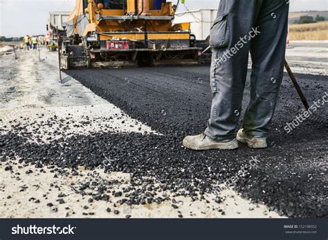 Worker Operating Asphalt Paver Machine During Stock Photo 152198552 | Shutterstock