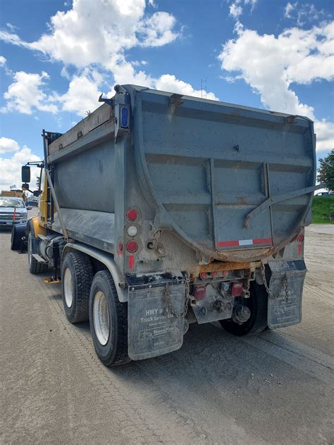 2003 VOLVO VHD DUMP TRUCK WITH SNOW PLOW AND SANDER - SOLD - Oxford ...