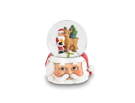 Premium Photo | Santa claus and a reindeer snow globe