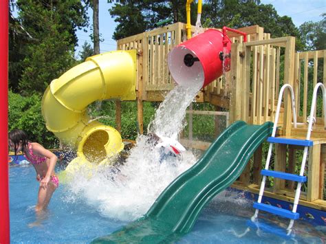 Look at this fabulous backyard water park that my husband (I mean my 3rd child) custom built in ...