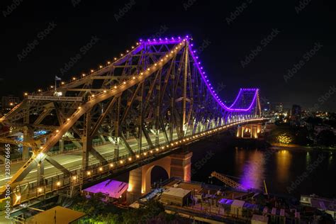 Story Bridge and brisbane river as seen at night Stock Photo | Adobe Stock