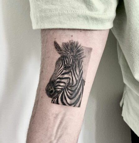 Unique And Eye-catching: Express Yourself With A Zebra Tattoo