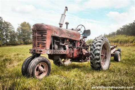 Old Farmall Tractor Dreams Rusty Old by garyhellerphotograph