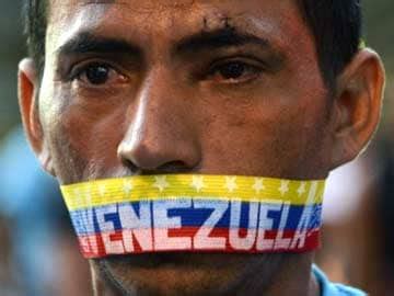 Venezuela's Nicolas Maduro calls for talks to defuse mass protests