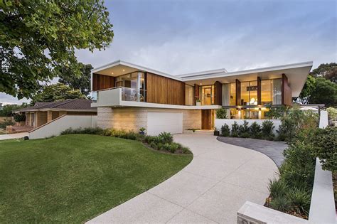 Stained Timber and Stonework Shape Mid-Century Modern Aussie Home | Decoist