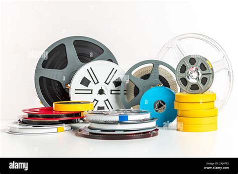 vintage 8mm film reels on a white background Stock Photo - Alamy