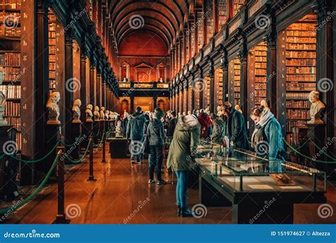 People Visiting Famous the Long Room in Old Library in Trinity College Dublin, Ireland ...