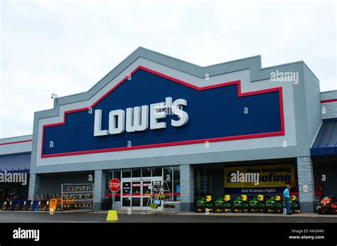 Lowe's home improvement center warehouse store with lawn tractors ...