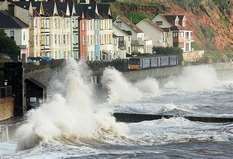 UK storm: South coast lashed by 25ft waves ahead of St Jude's storm | Daily Mail Online