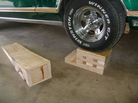 Car Ramps by andymarkv -- Homemade car ramps constructed from plywood and 2x4s. http://www ...