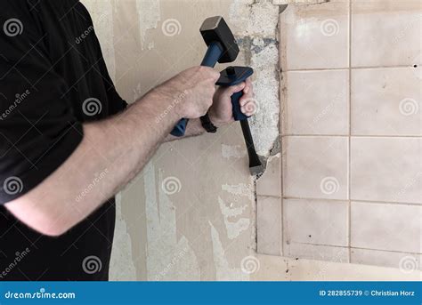 Removing Old Stained Tiles from Kitchen Wall with Hammer and Chisel Stock Image - Image of ...