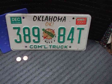 EXPIRED OKLAHOMA LICENSE PLATE WITH 2004 STICKER (389 84T)