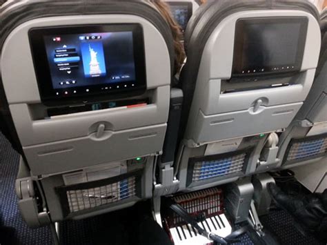 american airlines a319 exit row with accordion - The Adventures of Accordion Guy in the 21st Century