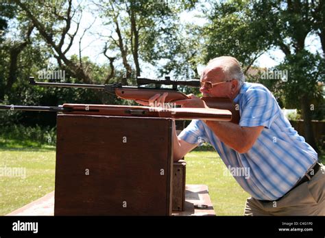 Man rifle Shooting Stock Photo - Alamy