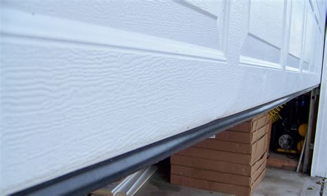 INSTALLING GARAGE DOOR BOTTOM SEAL KITS - Garage Door Weather Seal