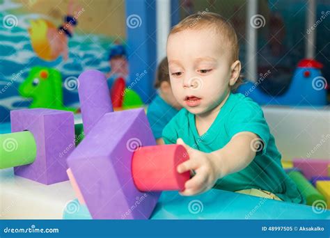 Little Boy Playing with Cubes Stock Image - Image of leisure, birthday: 48997505