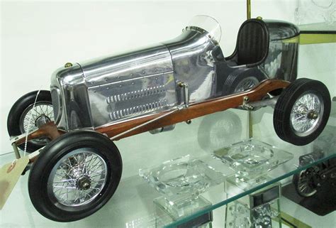 MODEL RACING CAR, in aluminium finish, 51cm L.