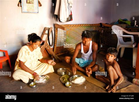 Ho tribes family eating food ; Chakradharpur ; Jharkhand ; India NO MR ...