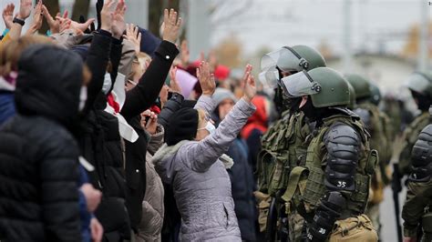 Belarus: Tens of thousands protest, defying warning shots - CNN