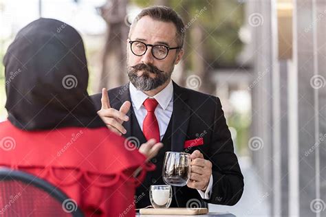 Senior Man in Smart Business Suit Talking To People and Sitting in Outdoor Coffee Table Stock ...