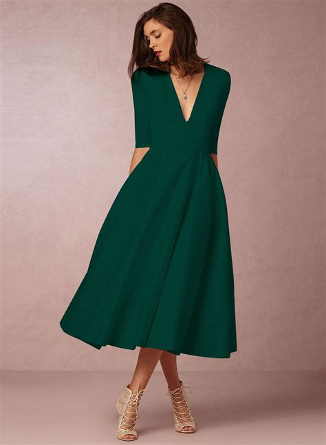 the dress is featuring v neck, half sleeve, solid color, a-line silhouette and maxi length ...