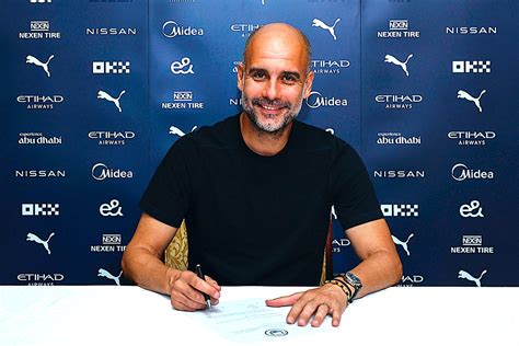 Guardiola signs new Man City contract