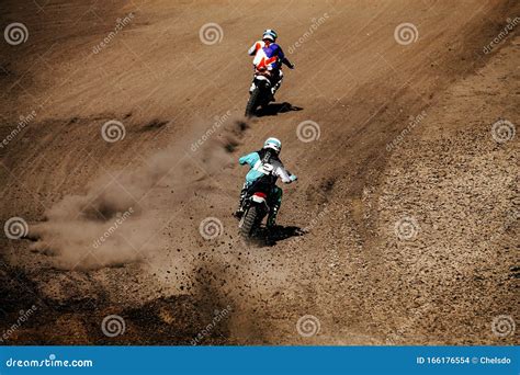 Back two motocross riders stock photo. Image of helmet - 166176554