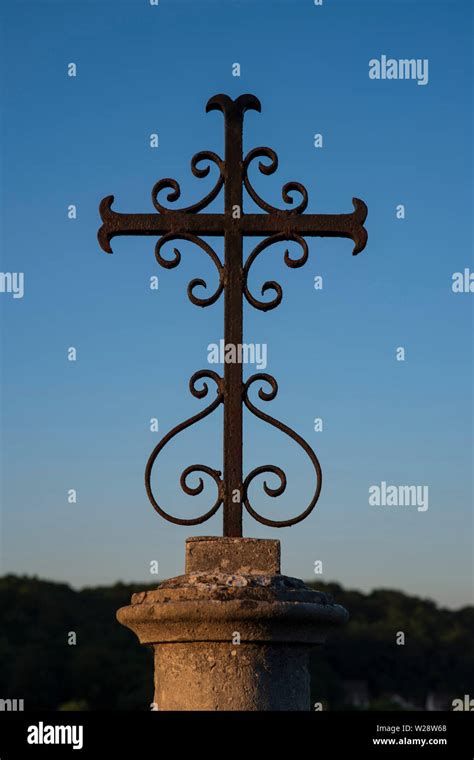 Ancient cross on a tomb in a cemetery Stock Photo - Alamy