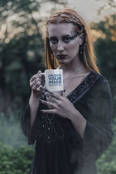 Placeit - Mockup of a Woman with Hand Tattoos Holding an 11 oz Coffee Mug