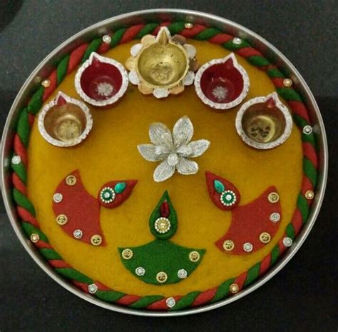 Pin by seema loharuka on Aarti ki thali | Thali decoration ideas, Arti thali decoration, Spoon ...